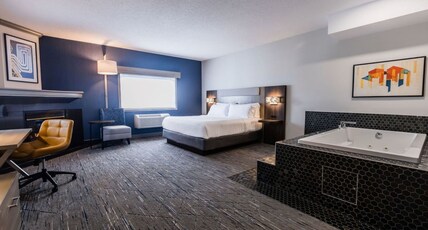 Holiday Inn Express & Suites Calgary South-Macleod Trail S Room Type - 1 King Suite Jetted Tub Fireplace