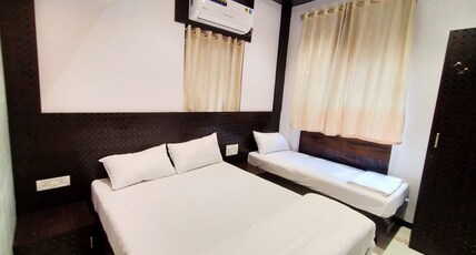 Hotel New Malabar Residency Room Type - Deluxe triple bed room
