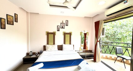 Hotel Laxmi Residency Room Type - AC Super Deluxe Room With Balcony