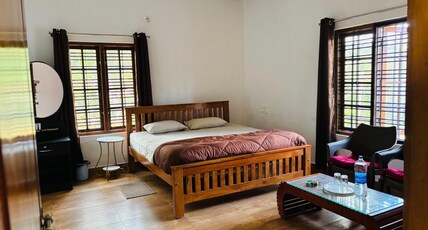 Prashi Homestay Room Type - Deluxe Double Room (2 Adults + 1 Child)