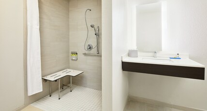 Holiday Inn Express Hotel & Suites Port Richey Room Type - 1 King Suite Comm Mobil Roll In Shower