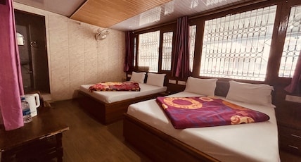Hotel Brahma Kamal (Near Joshimath Taxi Stand) Room Type - Deluxe Four Bed Hotel Brahma Kamal (Near Joshimath Taxi Stand) Room Type - Deluxe Four Bed