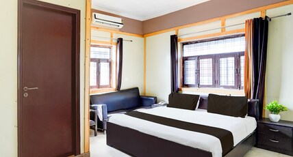 Super Hotel O GMS Road Ballupur Chowk Formerly Maira Residency Room Type - Classic with Balcony