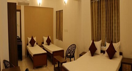 Kannur Residency Room Type - Family AC Deluxe Room