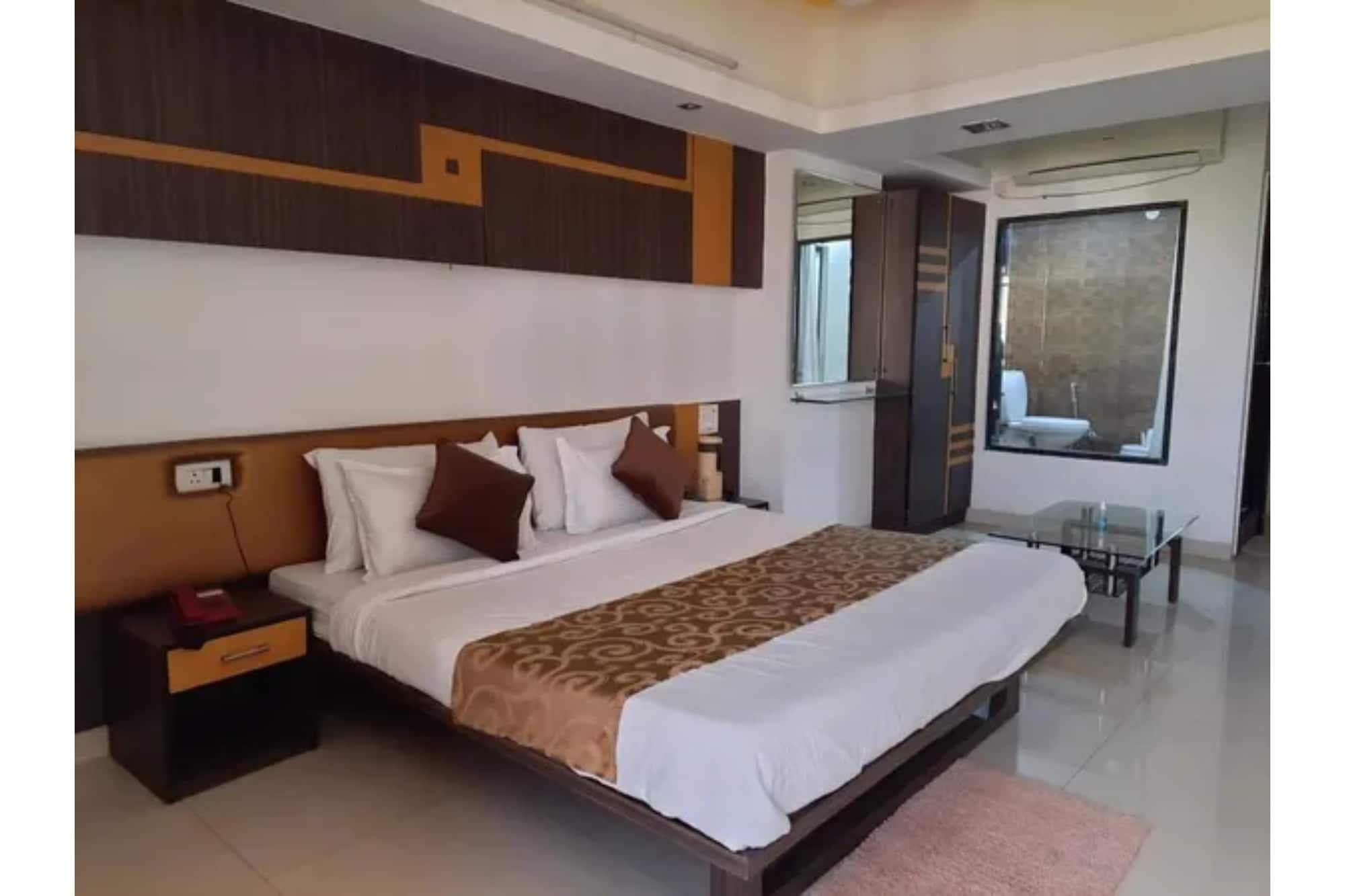 FabHotel Grand Suites - Tap to explore photos