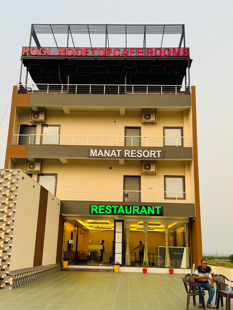 Manat Resort - Tap to explore photos