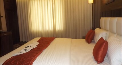 HOTEL RADHEY INN Room Type - Deluxe Room with City View