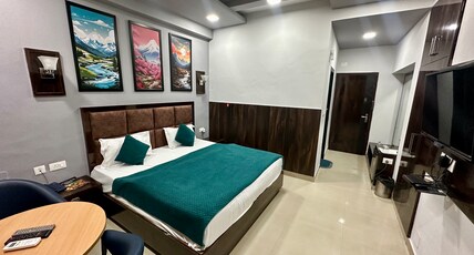 Hotel Deepshikha Room Type - DELUXE ROOM with City View
