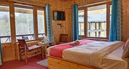 Riverside Mountain view cottage Room Type - Deluxe Room with Private Balcony Valley view