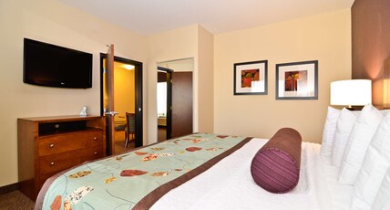 Best Western Plus Carousel Inn & Suites Room Type - Suite-1 King Bed, Non-Smoking, Separate Bedroom, Sofabed, Conference Table, Microwave And Refrigerat Best Western Plus Carousel Inn & Suites Room Type - Suite-1 King Bed, Non-Smoking, Separate Bedroom, Sofabed, Conference Table, Microwave And Refrigerat