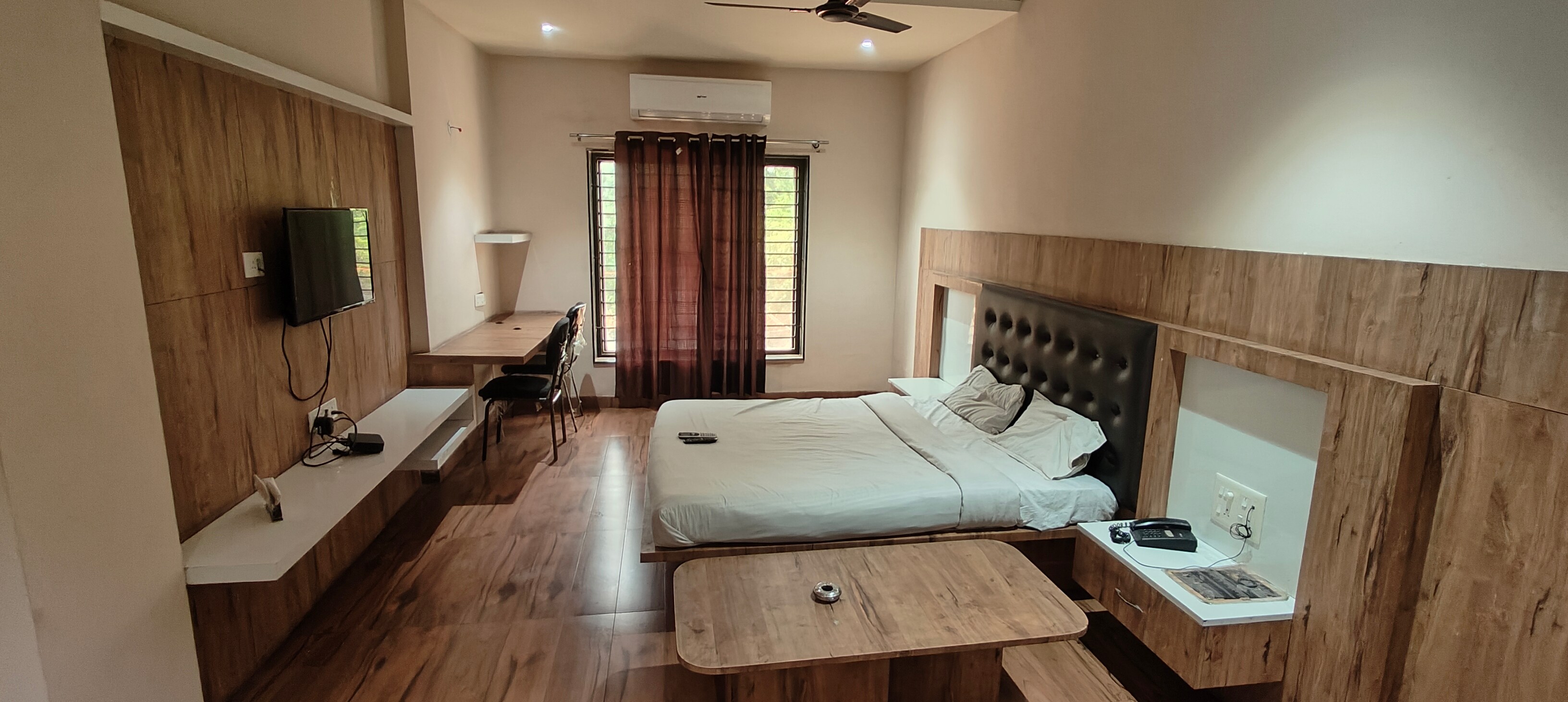 Hotel Sharda Regency - Tap to explore photos