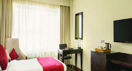 Ramada by Wyndham Jamshedpur Room Type - 2 Twin Beds Smoking Room
