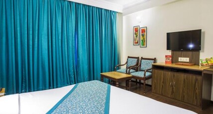 Mapple Abhay Room Type - Deluxe Room