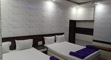 HOTEL TAIBA INTERNATIONAL Room Type - DELUXE QUADRUPLE ROOM