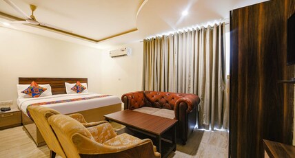 Hotel Lakshmi Palace Room Type - Deluxe Room with Balcony Free Wi-Fi ( Sanitized Room )