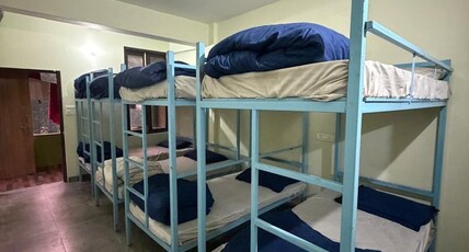 The Baba Benison Stays - 200 Metre From Temple Room Type - Sharing Dormitory Bed
