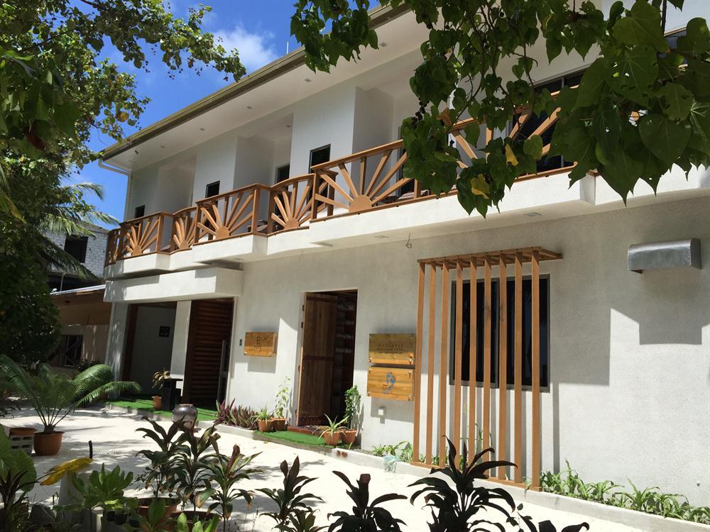 Maamadi Boutique Hotel - Tap to explore photos