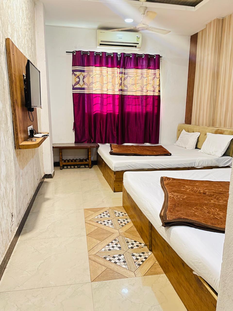 Hotel Amritam Inn - Tap to explore photos