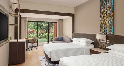Goa Marriott Resort & Spa Room Type - Guest Room 2 Queen Bed Garden View Patio with Garden Access Goa Marriott Resort & Spa Room Type - Guest Room 2 Queen Bed Garden View Patio with Garden Access
