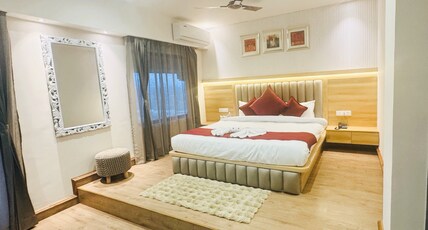 The Whispering Winds Resorts Room Type - Premium AC Mountain retreat with Balcony