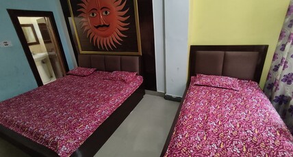 The Parika Guest House Room Type - Deluxe Room with 1 Double and 1 Single Bed