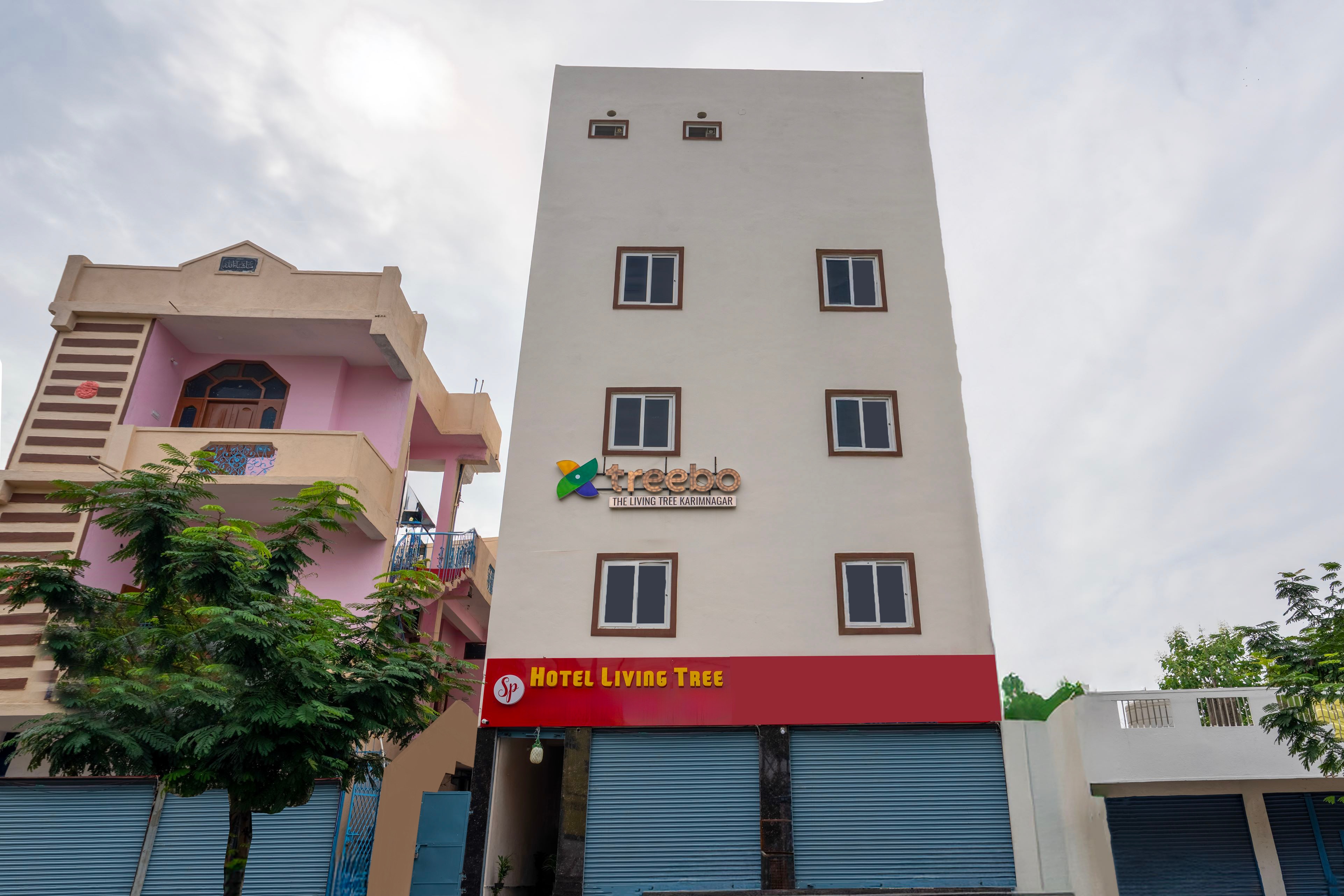 Treebo Living Tree Karimnagar - Tap to explore photos