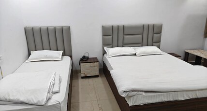 HOTEL CORPORATE INN Room Type - AC TRIPLE BED DELUXE