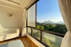 Serene Hill view 1BHK I Pool Gym I Udaipur