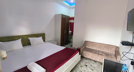 HOTEL AKASH GANGA Room Type - DOUBLE BED NON AC DELUXE