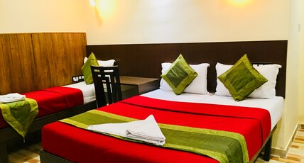 QubeStay TownHostel Room Type - AC Deluxe  Room with Attached Bathroom.