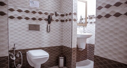 Greens Residency Room Type - Deluxe Room Ac