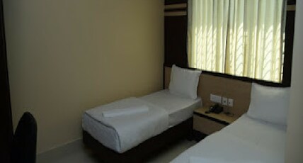 Hotel Nirvana Room Type - TWIN BED (AC)