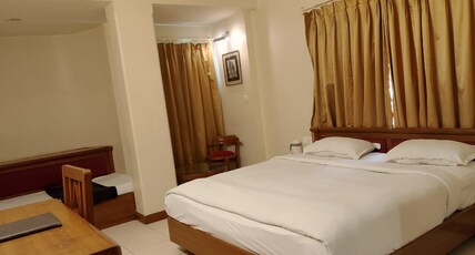 Hotel Suruchi (A minute walk from Gole ka Mandir) Room Type - Deluxe (3X)