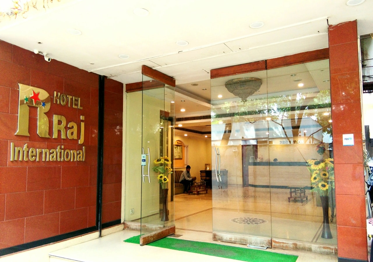 Hotel Raj International - Tap to explore photos