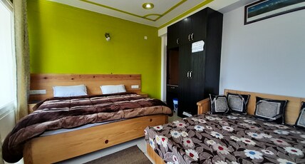 Kiwi Shadow Guest House Room Type - Deluxe Hill View Room | Sleeps 4