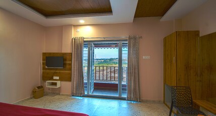 Heaven Garden Resort Room Type - Deluxe AC Room with Balcony