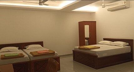 THE SAKTHI STAYS Room Type - Deluxe Room AC