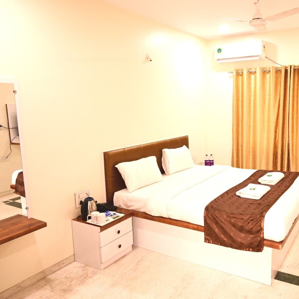 HOTEL DAKSH - Tap to explore photos