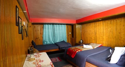 DIXIT HOMESTAAY & HOSTEL Room Type - Super dulex wooden room with hill view terrace