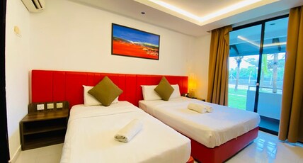 Alia Residence Room Type - Deluxe Triple Garden View