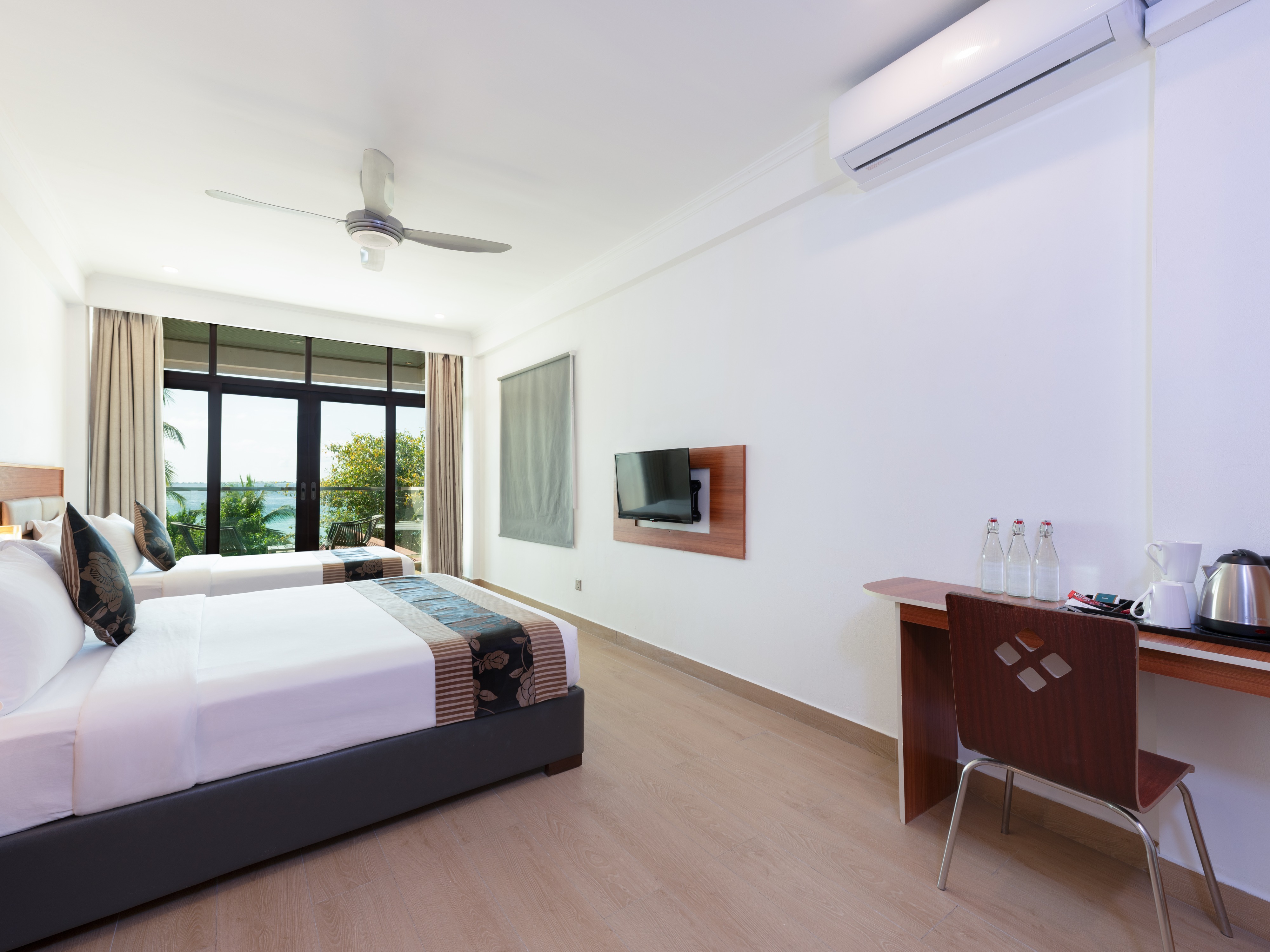 Kaani Beach Hotel - Tap to explore photos