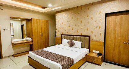 Hotel TrushaDham Room Type - Deluxe AC Room