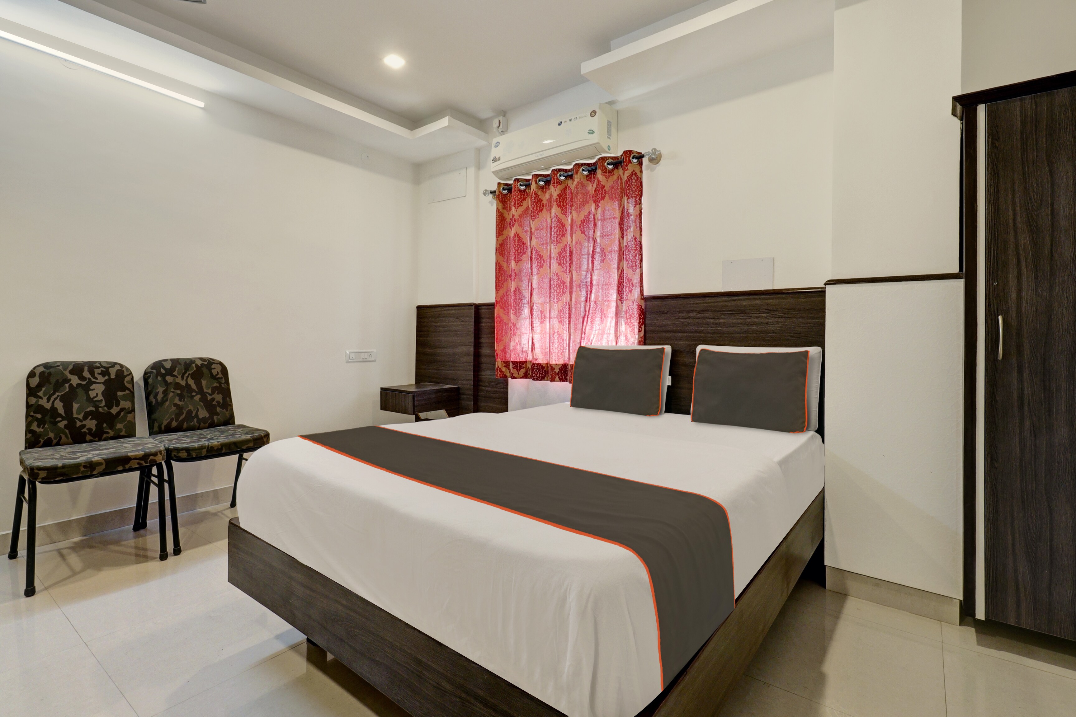 Hotel O Sapthagiri Suites Inn - Tap to explore photos
