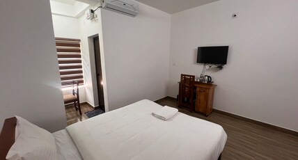 Ashtapadi Inn Room Type - DELUXE AC DOUBLE ROOM