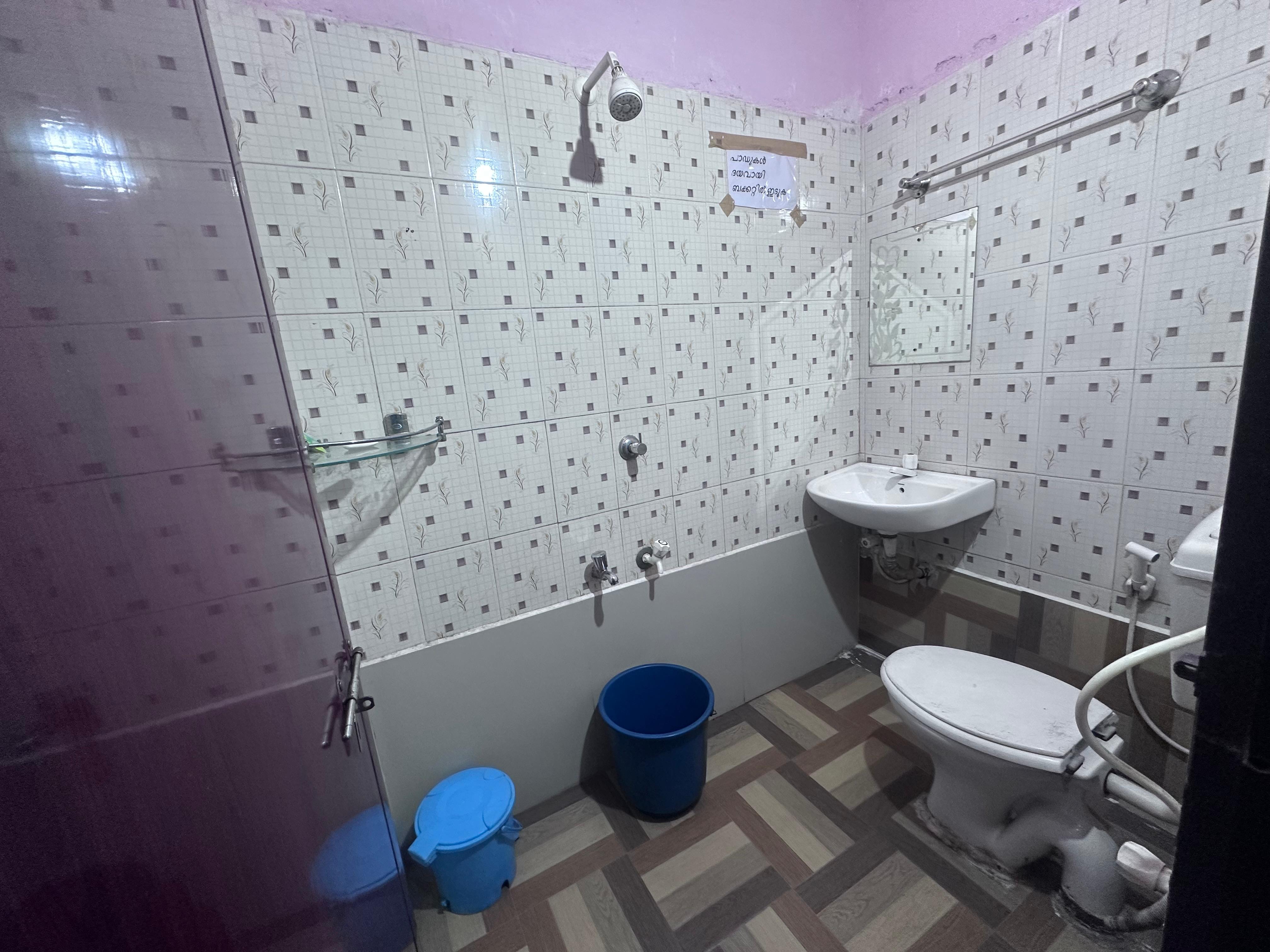 Tharavadu Rooms - Tap to explore photos