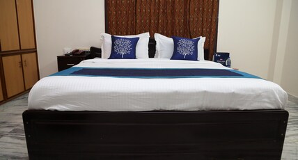 Sudha Grand Guestinn Room Type - Deluxe AC Room