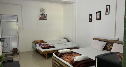vrundavan village resorts & home stay Room Type - Deluxe AC double bed room