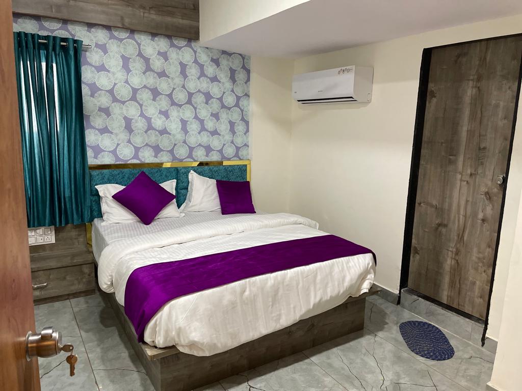 HOTEL KARNAVATI - Tap to explore photos
