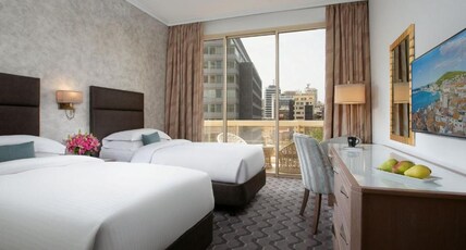Gefinor Rotana Room Type - City View Room with Lounge access - Twin Beds Gefinor Rotana Room Type - City View Room with Lounge access - Twin Beds