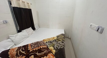 Shiv Mahima |500 Metres from Railway Station Room Type - Four Bedded Deluxe Room